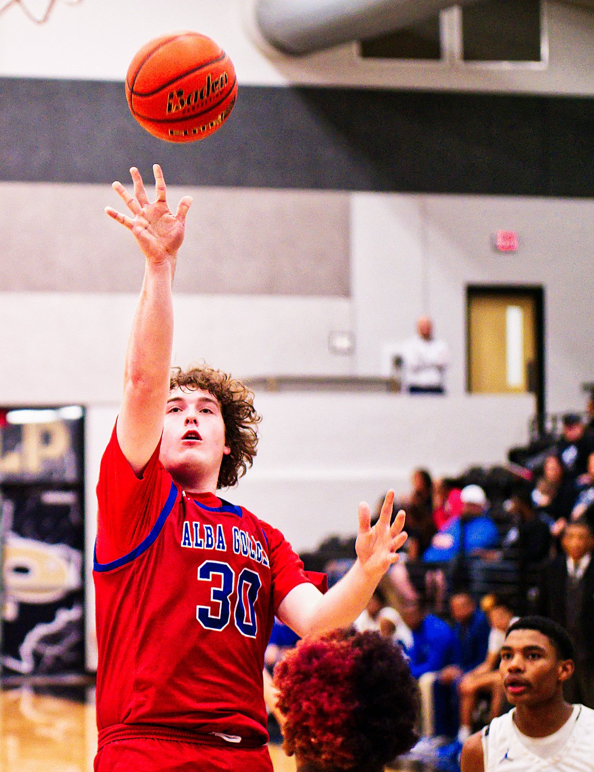 Conner Gibson puts of a mid-range jumper. [see more shots, buy basketball photos]